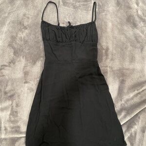 Aritzia Black Dress never worn. Size XS